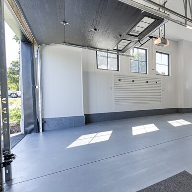 Trusscore Wall&CeilingBoard and Trusscore Slatwall in a Dream Home Garage