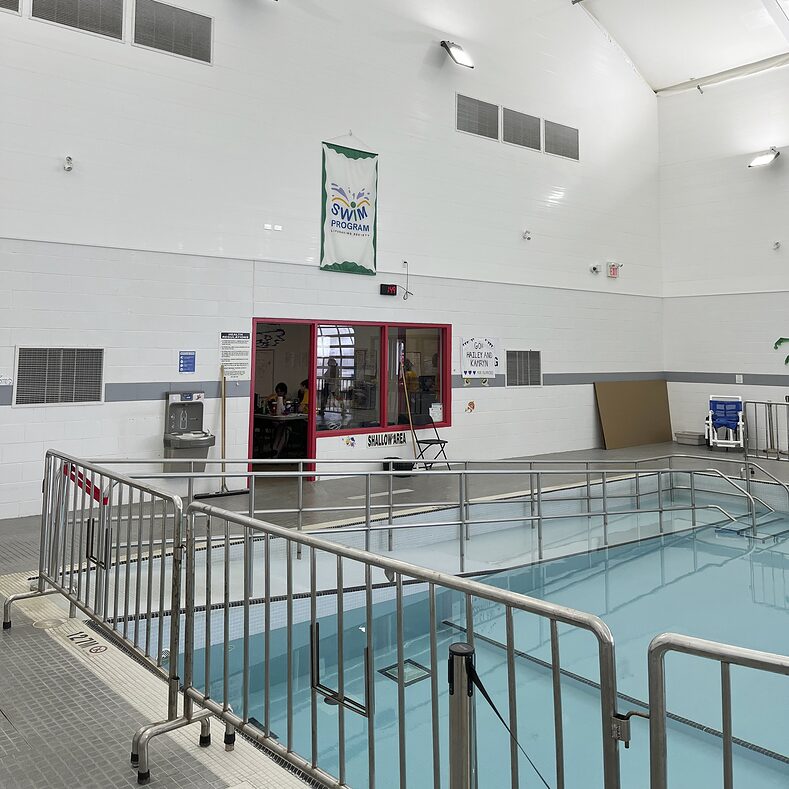 Trusscore wall&ceilingboard white installed in a commercial indoor pool
