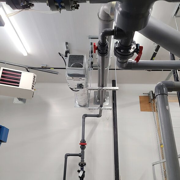Trusscore wall&ceilingboard white installed in a commercial indoor pool mechanical room