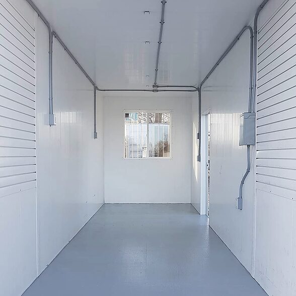 Trusscore wall&ceilingboard white installed in shipping container indoor growing facility