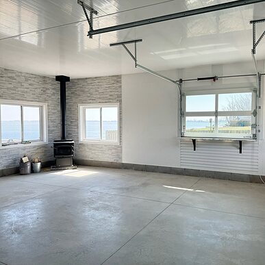 Trusscore wall&ceilingboard and slatwall white in residential boathouse
