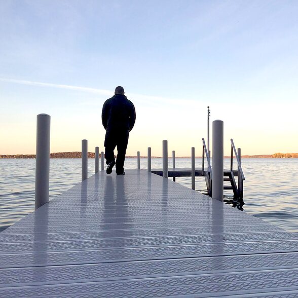 DockDeck by Trusscore crosshatch white installed on a residential dock and deck