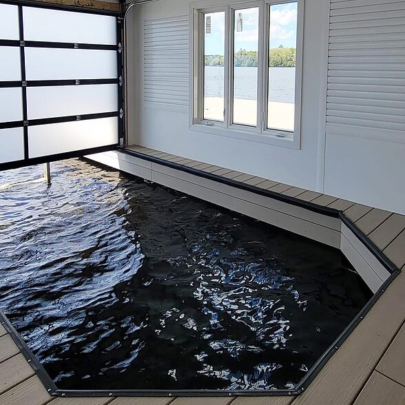 Trusscore wall&ceilingboard and Trusscore slatwall white installed in residential boathouse