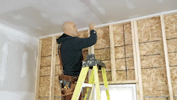 Install ceiling panels perpendicular to the ceiling joists