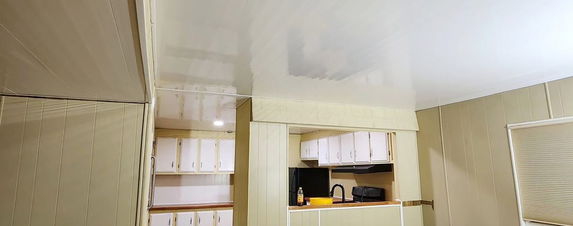 Mobile home living room featuring Trusscore