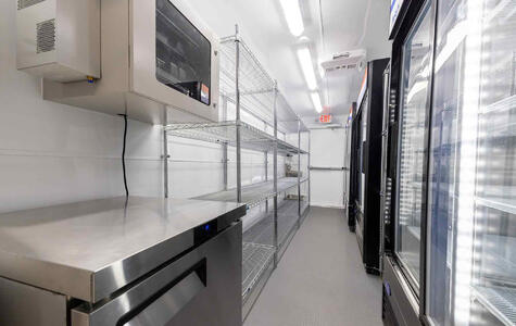 Trusscore Wall&CeilingBoard in a Mobile Grocery Kitchen