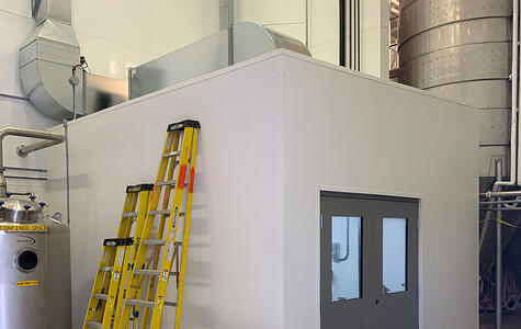 Trusscore white wall&ceilingboard installed in a brewery on the ceiling and walls