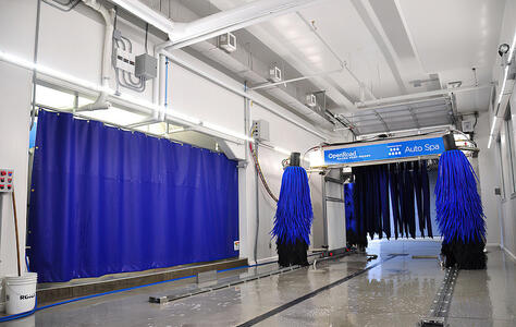 Trusscore white wallandceilingboard installed on walls and ceiling of car wash
