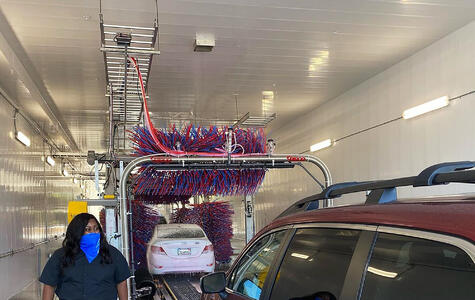 Trusscore white wallandceilingboard installed in a car wash facility