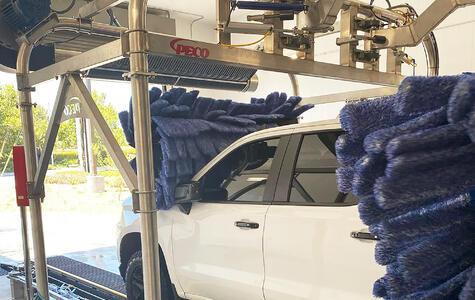 Trusscore white wallandceilingboard installed in a car wash facility