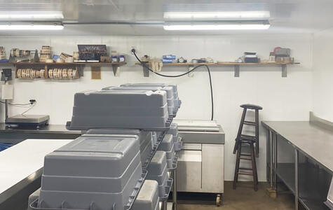Trusscore white wallandceilingboard installed in a commercial kitchen