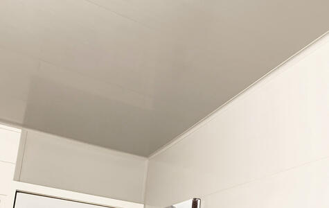 Trusscore gray and white wall&ceilingboard installed horizontally on bathroom walls and ceiling