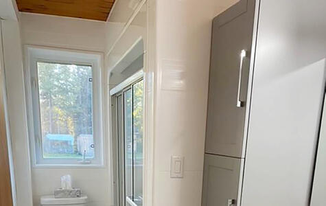 Trusscore white wall&ceilingboard installed horizontally on modern bathroom walls