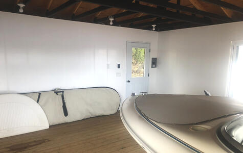 Trusscore white wall&ceilingboard installed on the walls of a boathouse