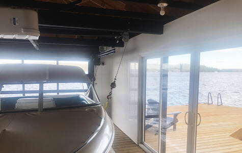 Trusscore white wall&ceilingboard installed on the walls of a boathouse