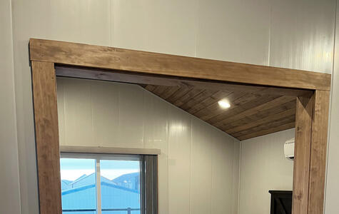Trusscore gray wall&ceilingboard installed on the walls of a boathouse