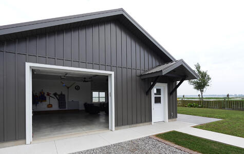 Trusscore Wall&CeilingBoard and SlatWall in Residential Boathouse Exterior