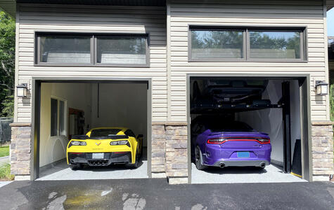 Trusscore Wall&CeilingBoard in a Residential Garage with a Car Hoist