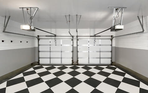 Trusscore white and gray wall&ceilingboard and slatwall installed on the walls and ceiling of the double car garage