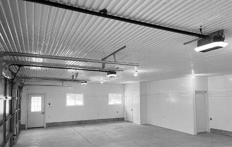 Trusscore Wall&CeilingBoard, SlatWall, and Ribcore in a Residential Garage