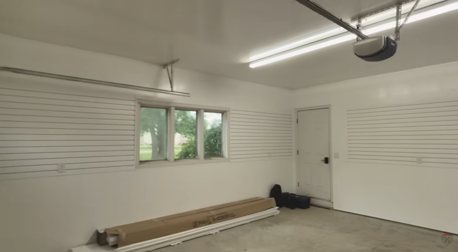 RR Buildings two-car garage finished with Trusscore Wall&CeilingBoard and SlatWall